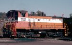 Jefferson Warrior Railroad WAMX SW1500 #1516, flying red flags on the "F" end, switching coal loads 